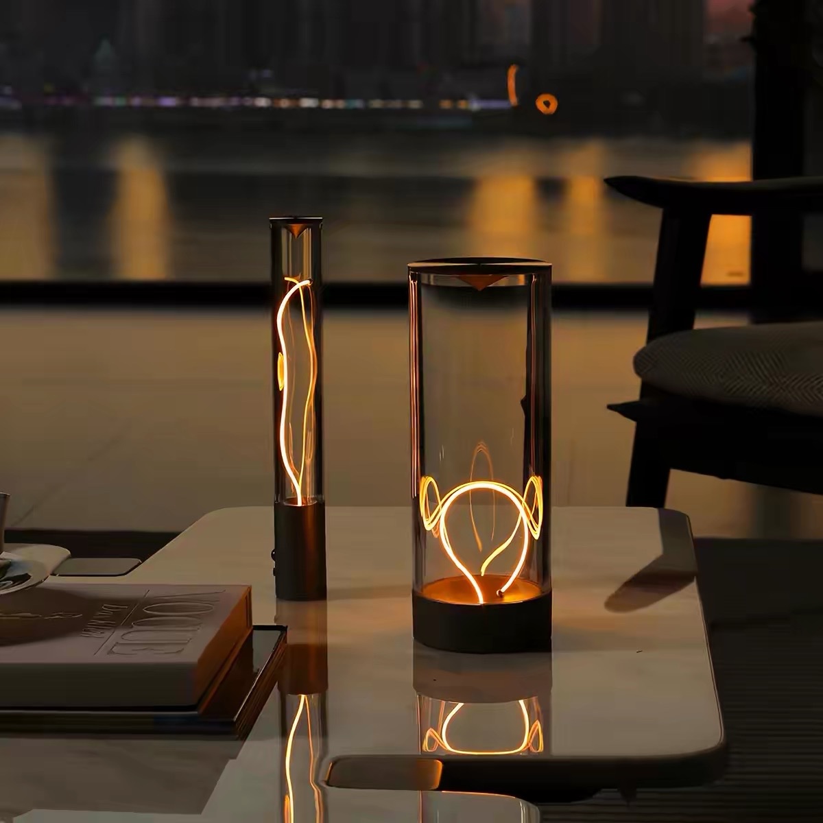 Akary sculptural lighting displayed in a black marble showroom