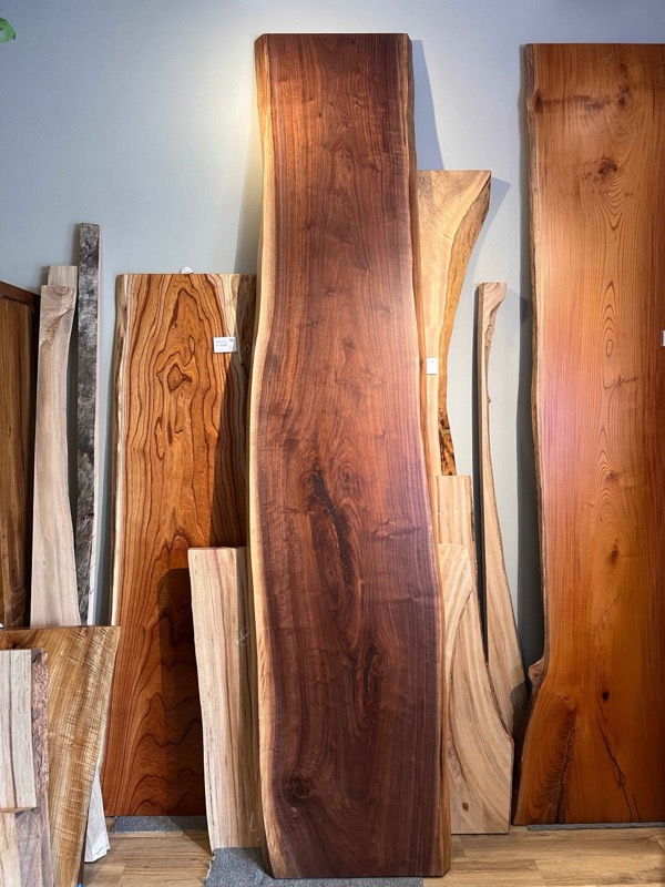 Close-up of American Black Walnut grain on a polished table surface
