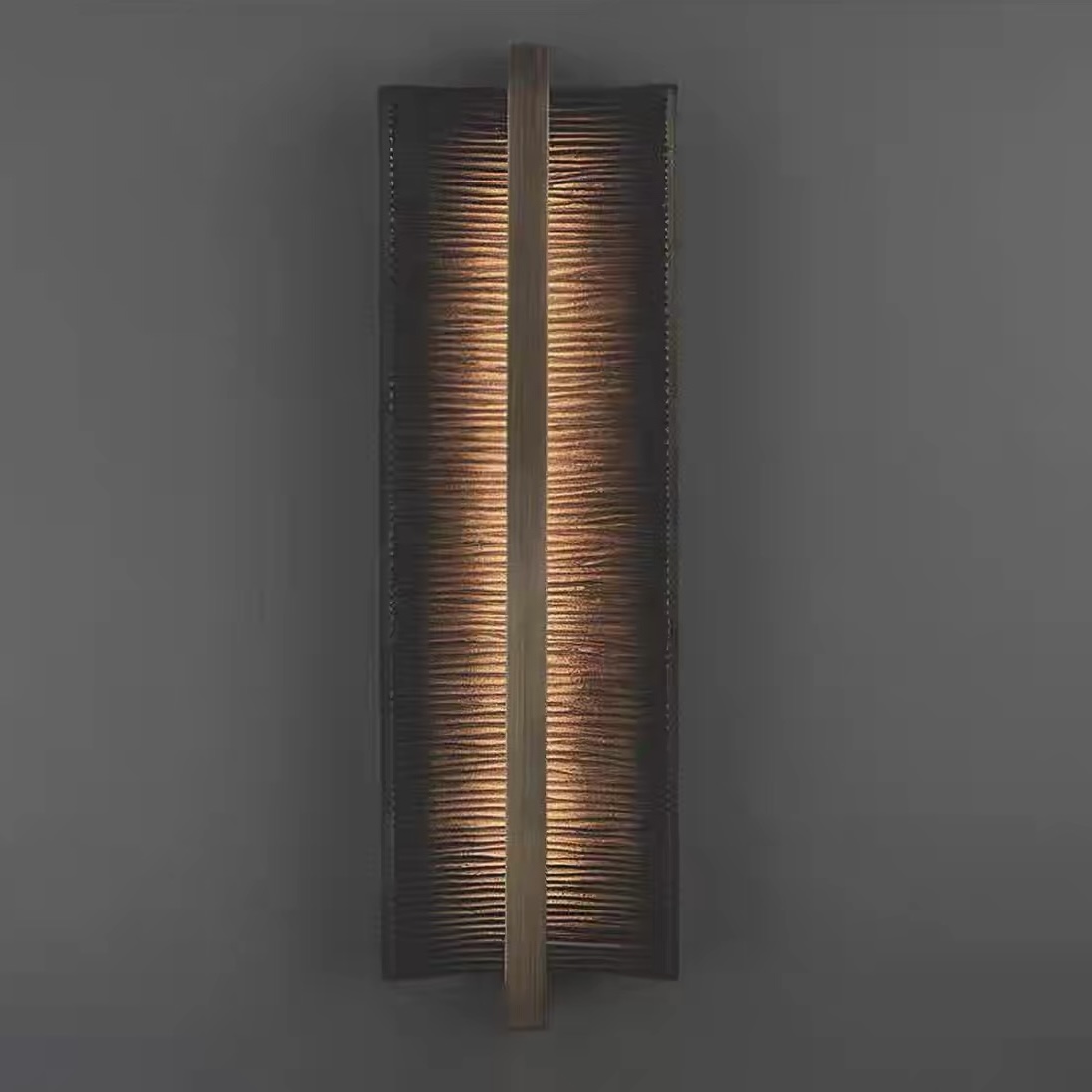 Aurelia Wave Wall Light on a warm plaster wall