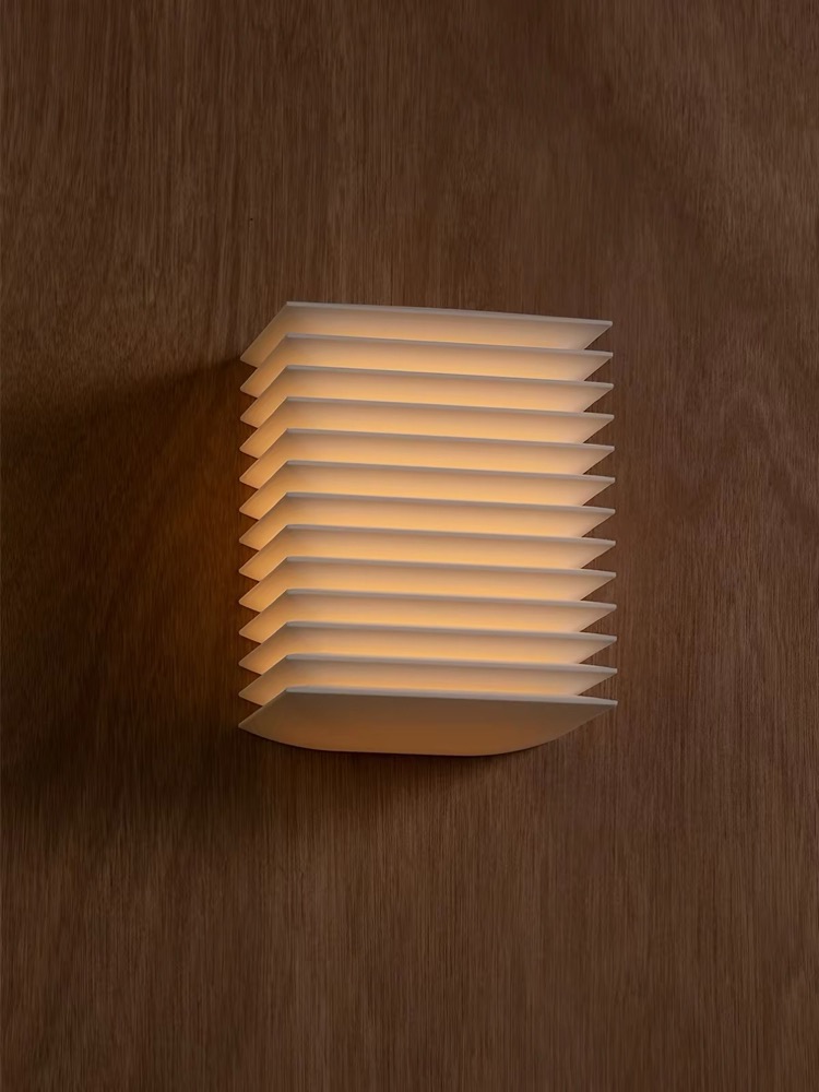 LumaFold Pleated Wall Light, on timber
