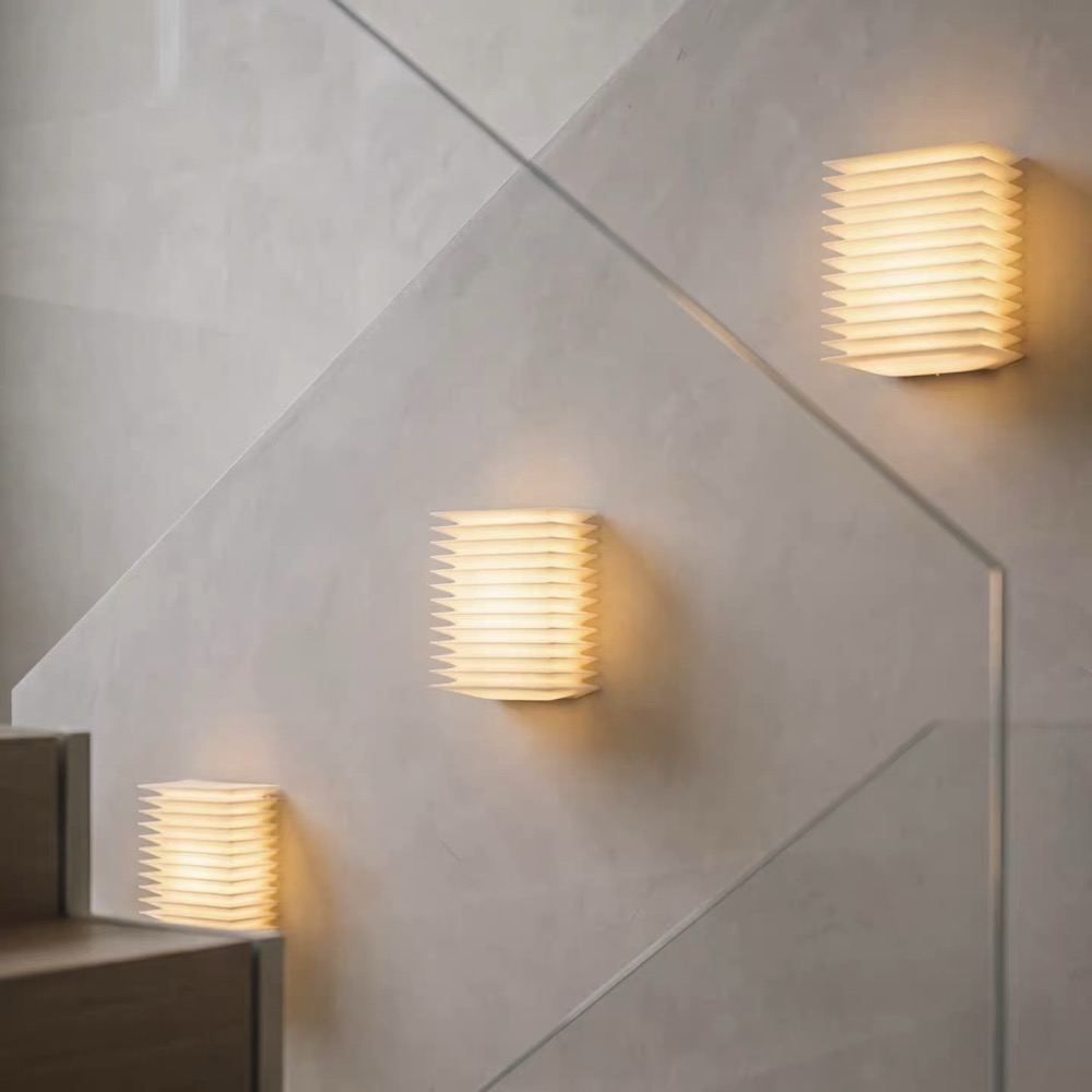 LumaFold Pleated Wall Light, along a staircase