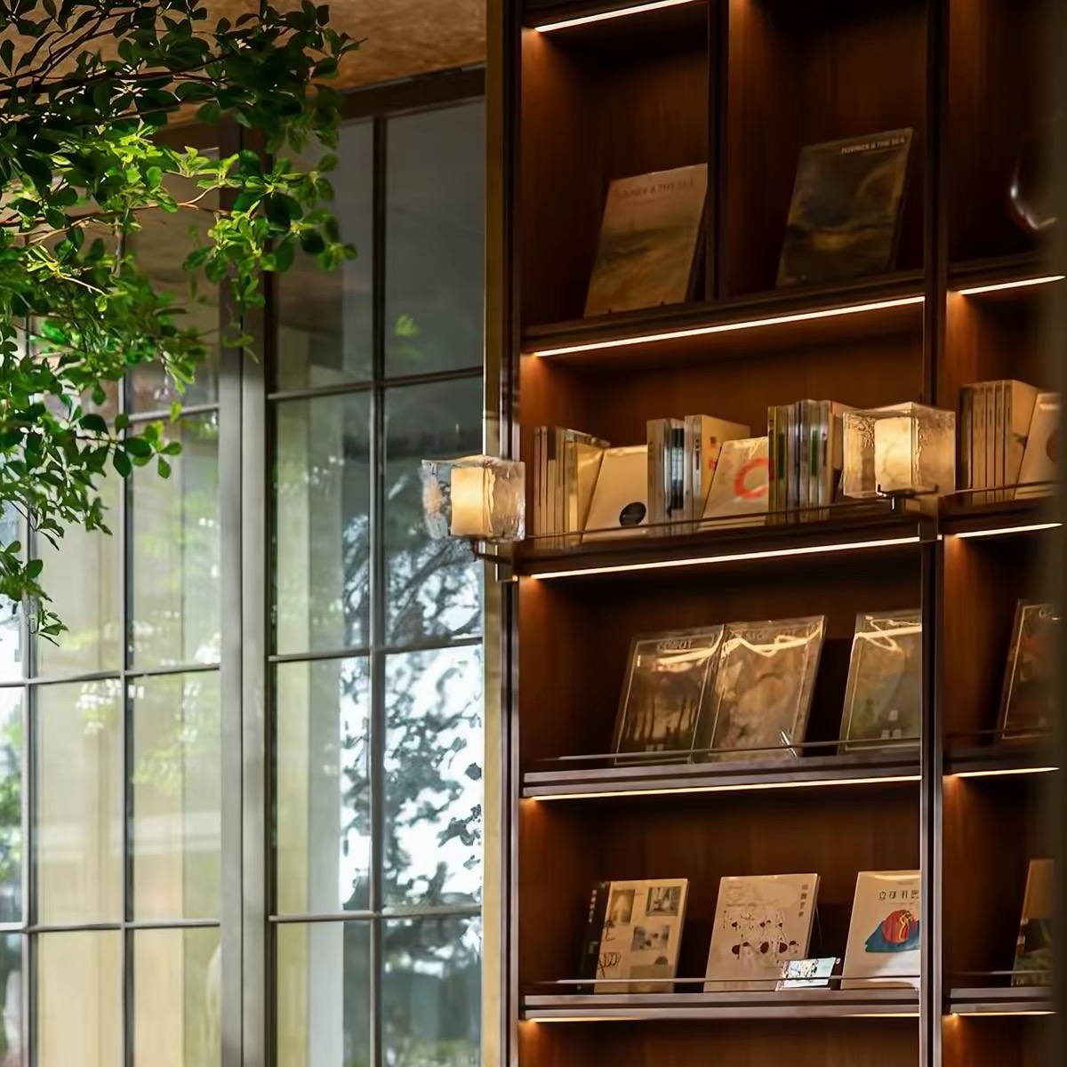 Aurelia Wall Sconce in a library setting