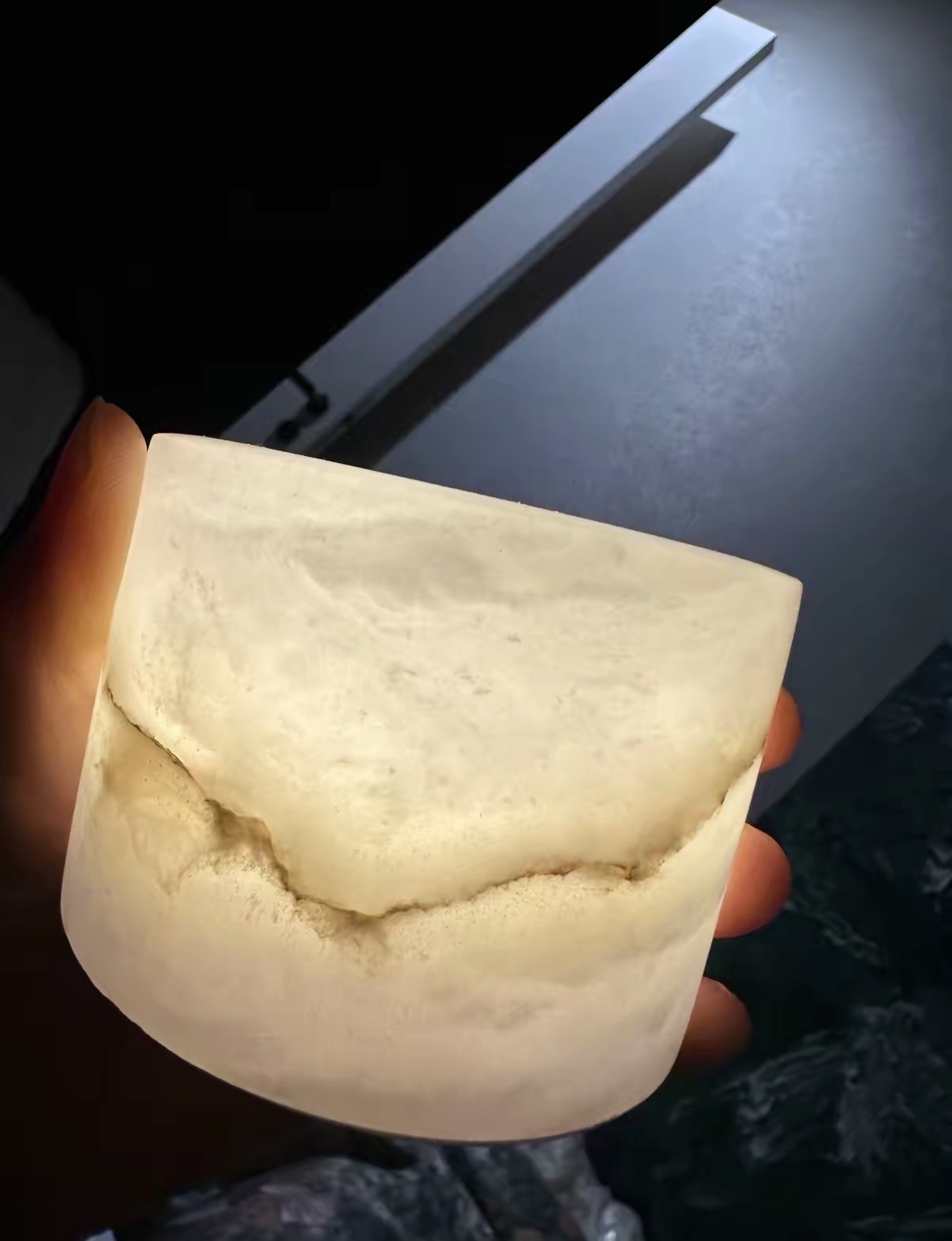 Translucent marble illuminated by touch-controlled light