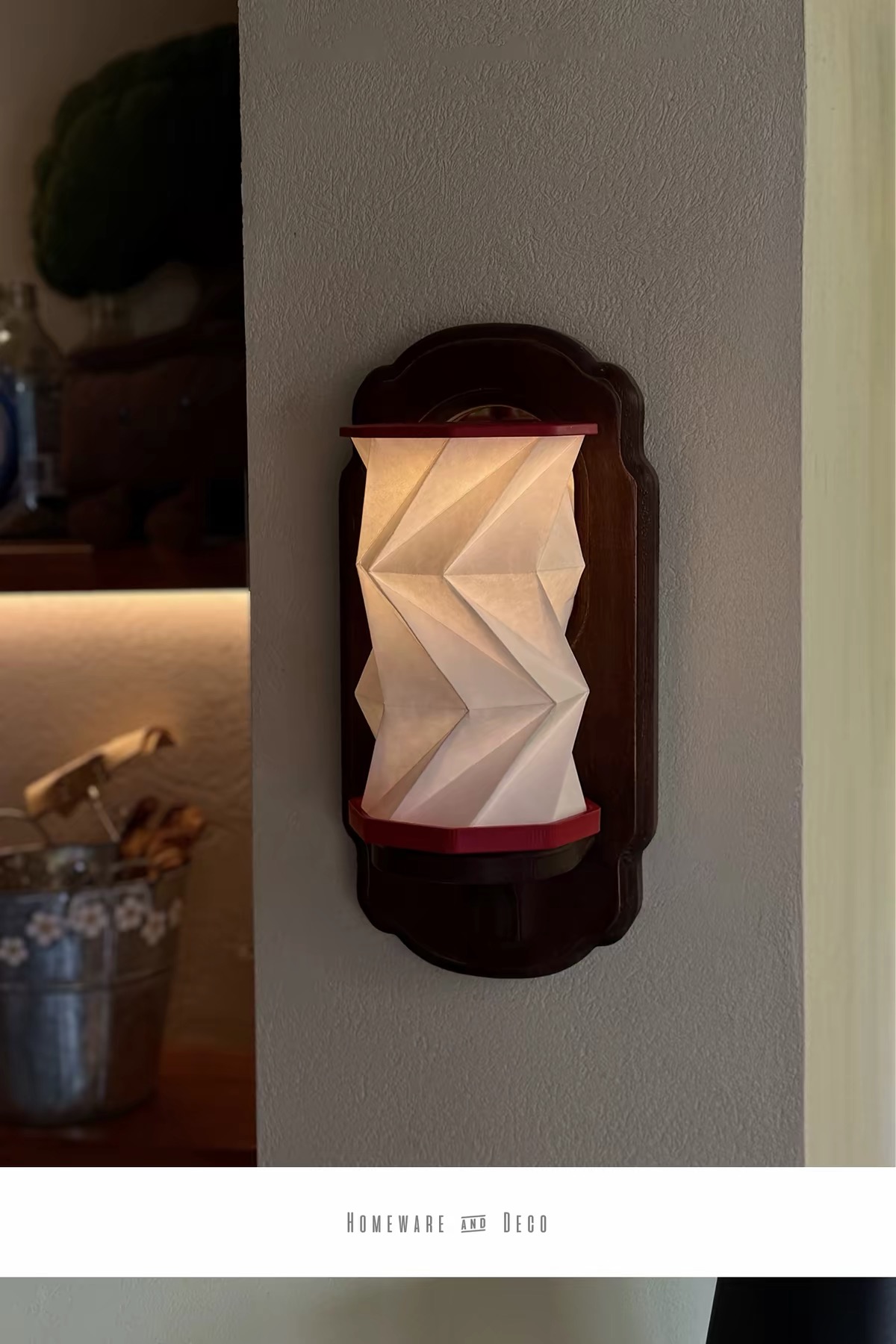 Ori Fold lamp in a bedside setting