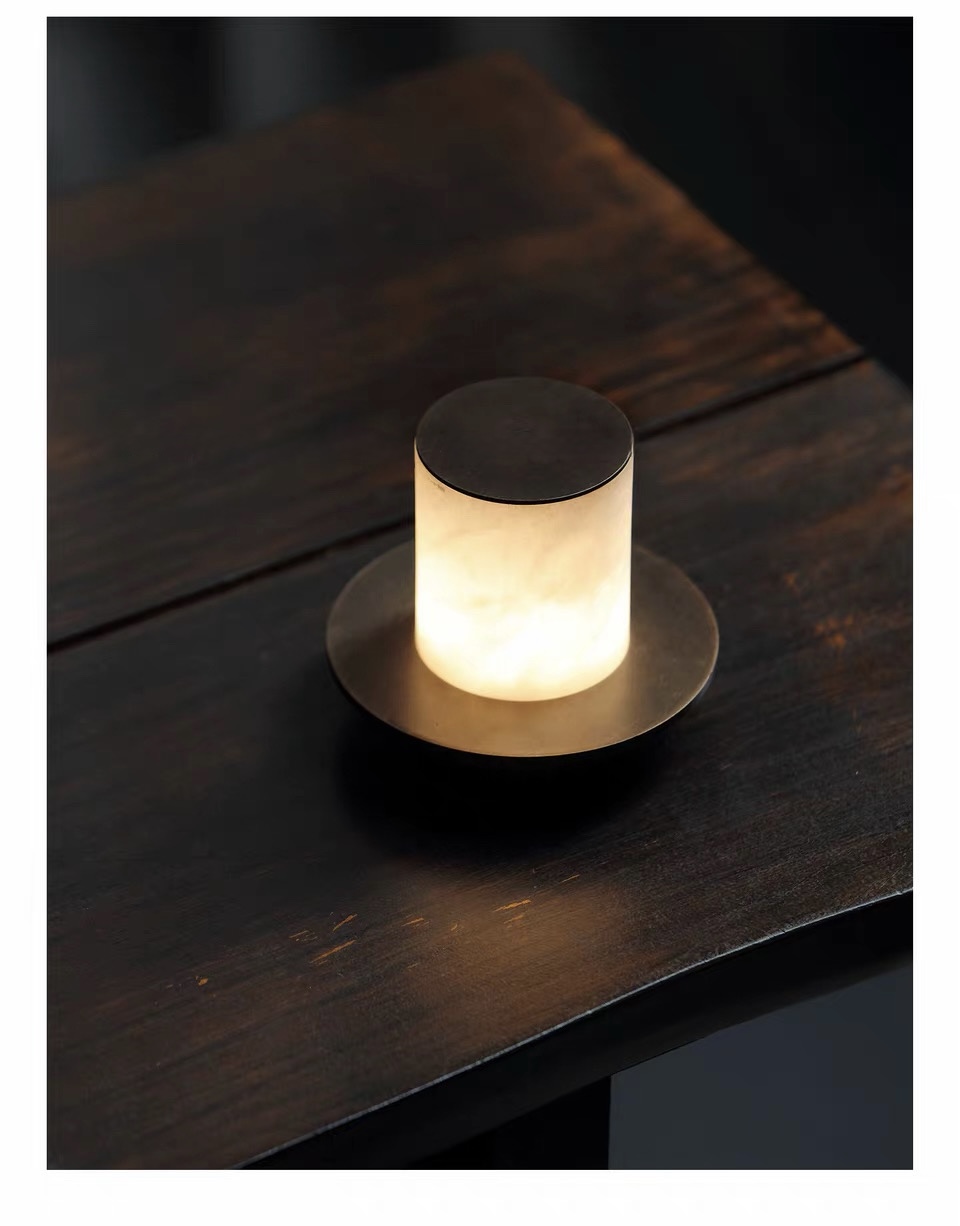 Halo Veil lamp on a dark wood table