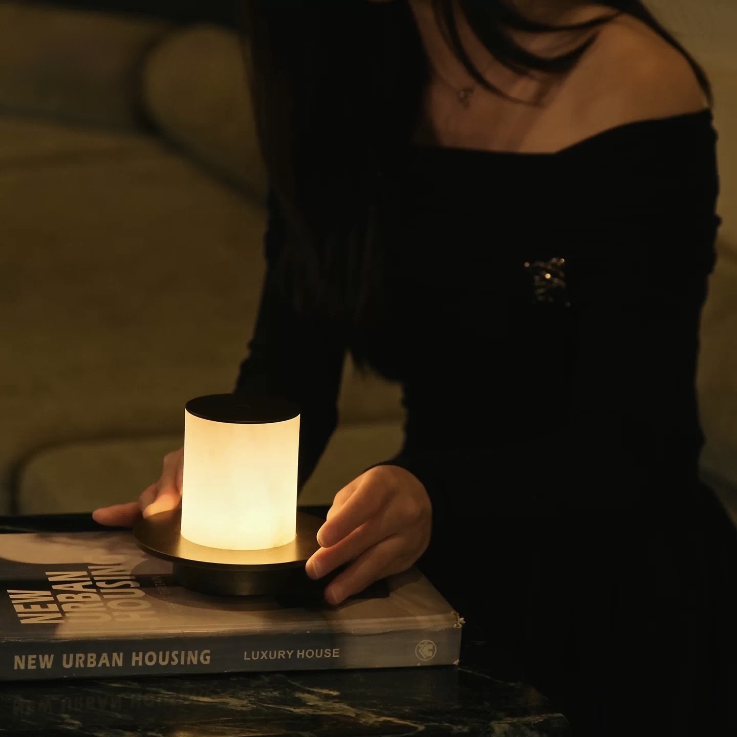 Halo Veil lamp styled on a book stack