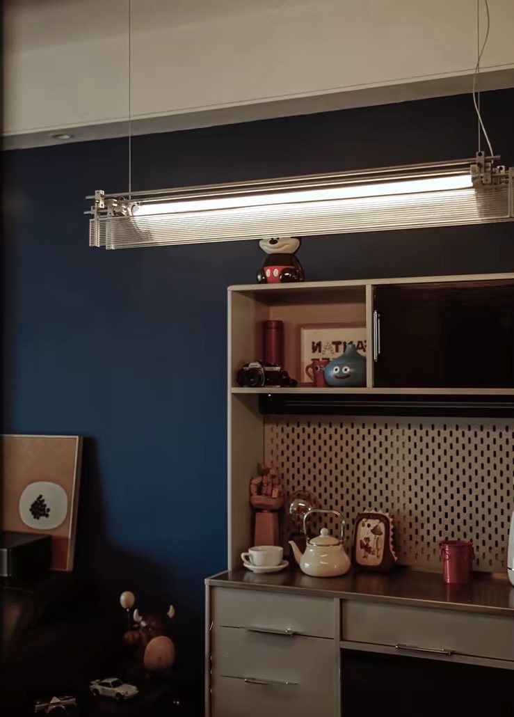 Linea Prism Wall Light on charcoal plaster