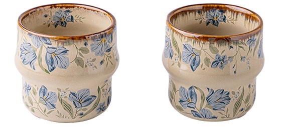 Two views of the Blue Botanica cup showing its floral pattern and stepped profile