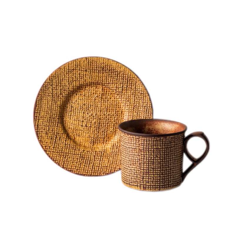 Toasted Amber coffee cup with a matching textured saucer