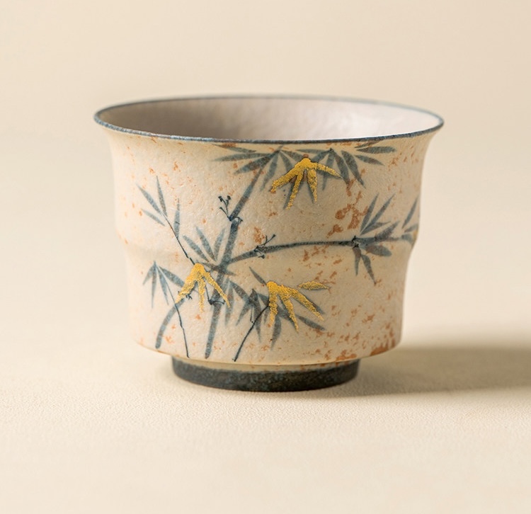 Akary ceramic cups on a travertine table in morning light